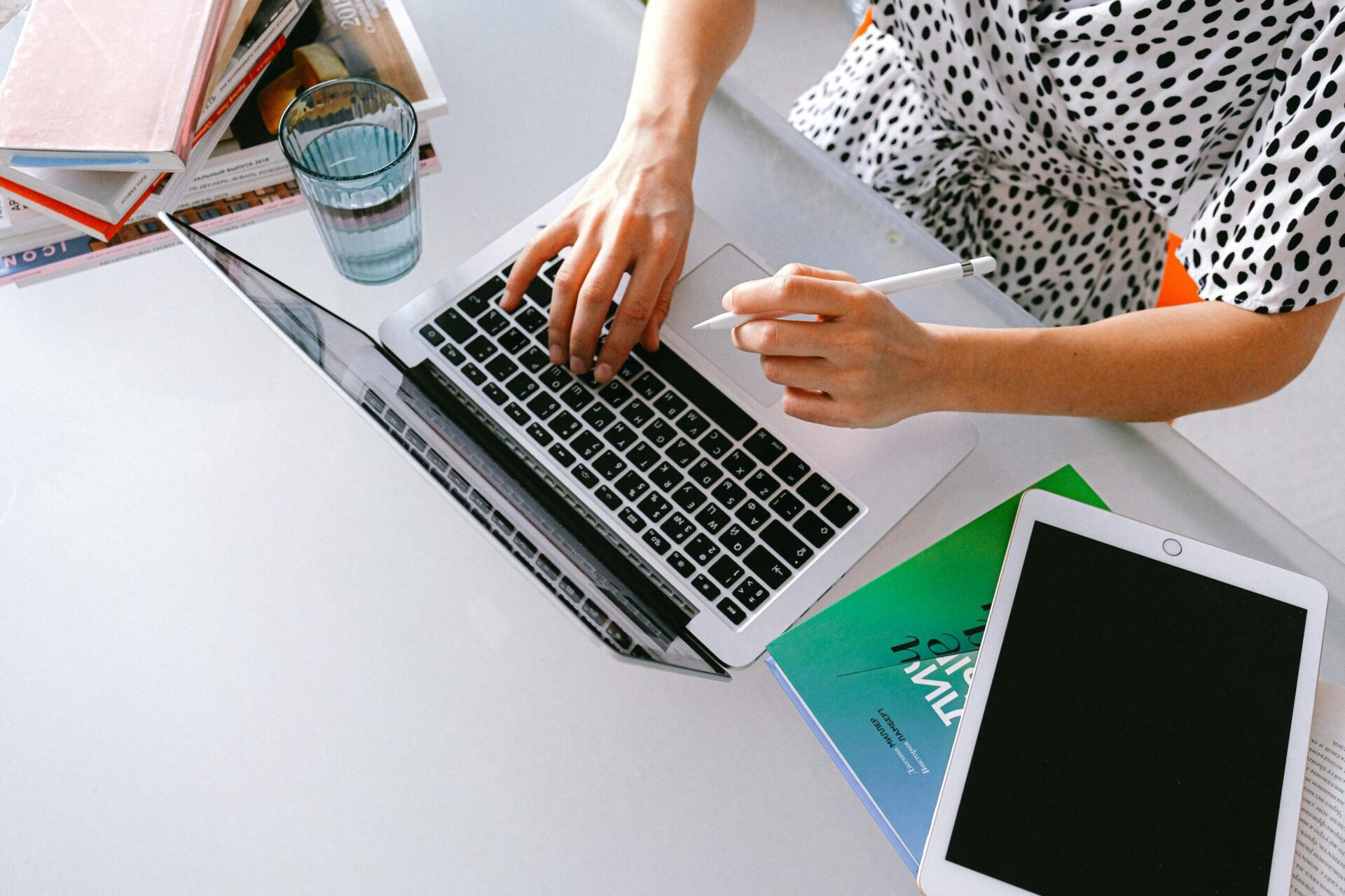 Person typing on laptop at desk